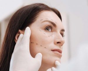 Woman Beign Examined for a Facelift NYC