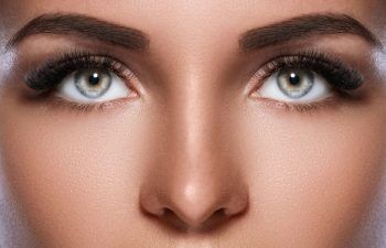 Close up of the beautiful young woman's upper face