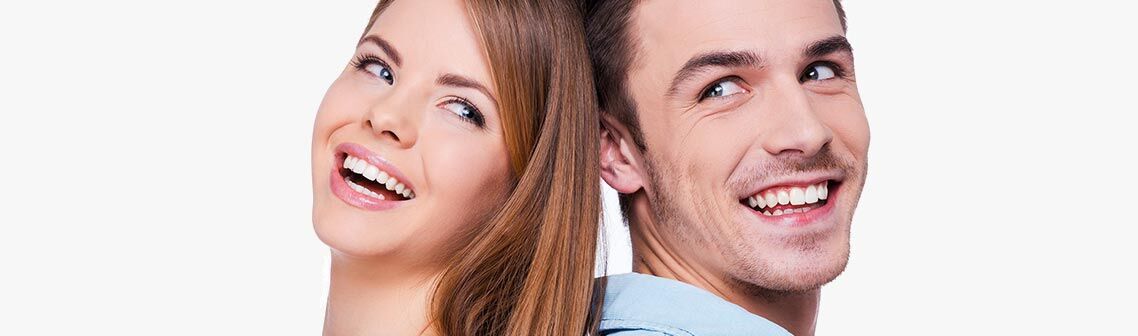 Happy, smiling couple looking at each other.